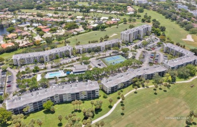 Beautiful 2 bed 2 bath unit in The Palms of Deer Creek located on Deer Creek Golf Club in Florida - for sale on GolfHomes.com, golf home, golf lot