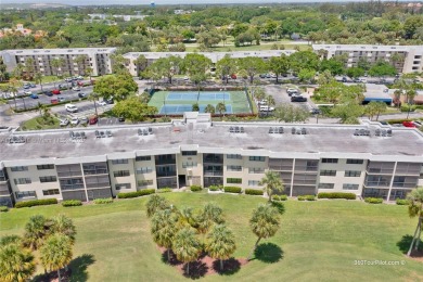 Beautiful 2 bed 2 bath unit in The Palms of Deer Creek located on Deer Creek Golf Club in Florida - for sale on GolfHomes.com, golf home, golf lot