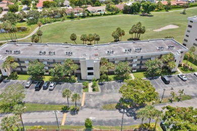 Beautiful 2 bed 2 bath unit in The Palms of Deer Creek located on Deer Creek Golf Club in Florida - for sale on GolfHomes.com, golf home, golf lot