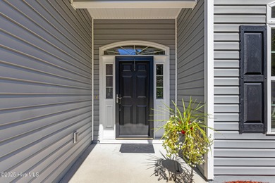 EXCEPTIONAL IS THE WORD! This pristine home is tucked away on a on Carolina Shores Golf Course in North Carolina - for sale on GolfHomes.com, golf home, golf lot