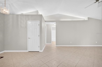 This single-family home is situated in the desirable Cypress on The Grand Club Cypress Course in Florida - for sale on GolfHomes.com, golf home, golf lot