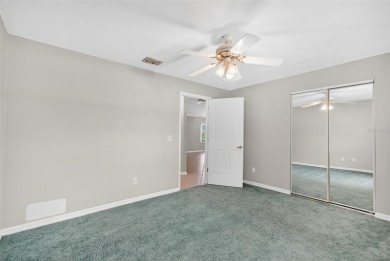 This single-family home is situated in the desirable Cypress on The Grand Club Cypress Course in Florida - for sale on GolfHomes.com, golf home, golf lot