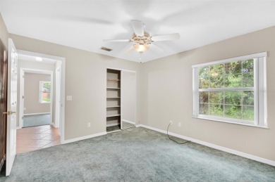 This single-family home is situated in the desirable Cypress on The Grand Club Cypress Course in Florida - for sale on GolfHomes.com, golf home, golf lot