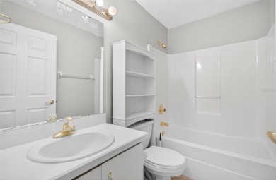 This single-family home is situated in the desirable Cypress on The Grand Club Cypress Course in Florida - for sale on GolfHomes.com, golf home, golf lot