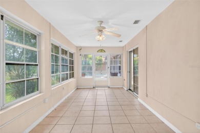 This single-family home is situated in the desirable Cypress on The Grand Club Cypress Course in Florida - for sale on GolfHomes.com, golf home, golf lot
