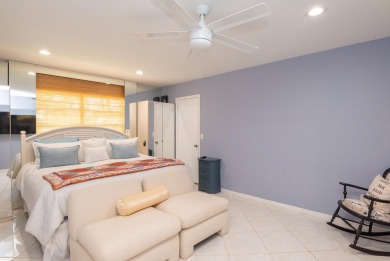 Gorgeous and fully updated WATERFRONT, lake view, corner unit in on Boca Lago Golf and Country Club in Florida - for sale on GolfHomes.com, golf home, golf lot