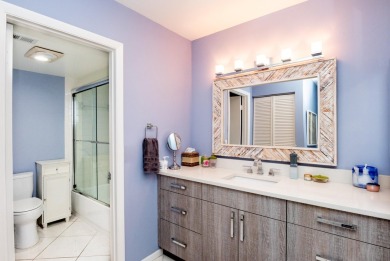 Gorgeous and fully updated WATERFRONT, lake view, corner unit in on Boca Lago Golf and Country Club in Florida - for sale on GolfHomes.com, golf home, golf lot