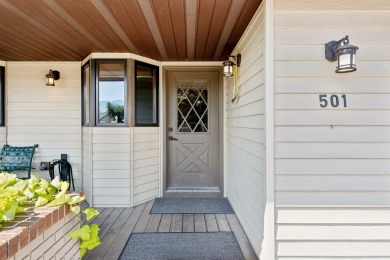 Park in the circular drive and enter this lovely home just on Polson Bay Golf Course - Championship Course in Montana - for sale on GolfHomes.com, golf home, golf lot