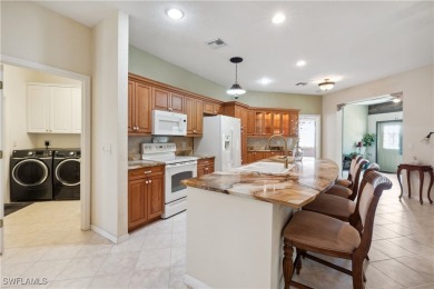 This awesome home in popular Herons Glen Golf Community is on Herons Glen Golf and Country Club in Florida - for sale on GolfHomes.com, golf home, golf lot