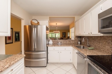 Gorgeous and fully updated WATERFRONT, lake view, corner unit in on Boca Lago Golf and Country Club in Florida - for sale on GolfHomes.com, golf home, golf lot