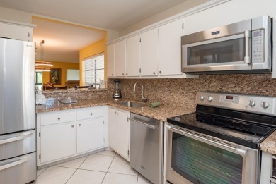 Gorgeous and fully updated WATERFRONT, lake view, corner unit in on Boca Lago Golf and Country Club in Florida - for sale on GolfHomes.com, golf home, golf lot