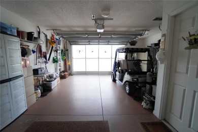 Under contract-accepting backup offers. This charming Austin on The Links of Spruce Creek in Florida - for sale on GolfHomes.com, golf home, golf lot