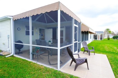 Under contract-accepting backup offers. This charming Austin on The Links of Spruce Creek in Florida - for sale on GolfHomes.com, golf home, golf lot