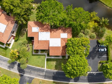 Gorgeous and fully updated WATERFRONT, lake view, corner unit in on Boca Lago Golf and Country Club in Florida - for sale on GolfHomes.com, golf home, golf lot