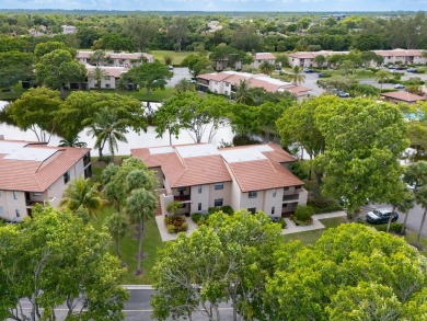 Gorgeous and fully updated WATERFRONT, lake view, corner unit in on Boca Lago Golf and Country Club in Florida - for sale on GolfHomes.com, golf home, golf lot