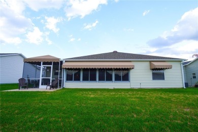 Under contract-accepting backup offers. This charming Austin on The Links of Spruce Creek in Florida - for sale on GolfHomes.com, golf home, golf lot