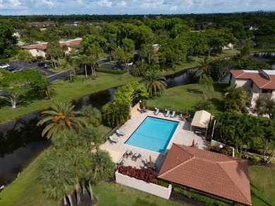 Gorgeous and fully updated WATERFRONT, lake view, corner unit in on Boca Lago Golf and Country Club in Florida - for sale on GolfHomes.com, golf home, golf lot