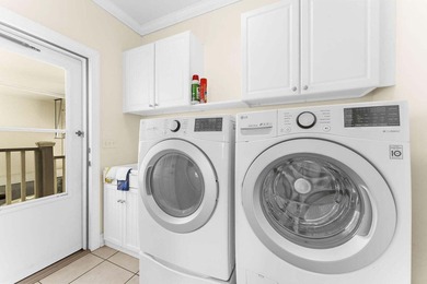 Set along the 10th fairway of the Santee National Golf Club on Santee National Golf Course in South Carolina - for sale on GolfHomes.com, golf home, golf lot