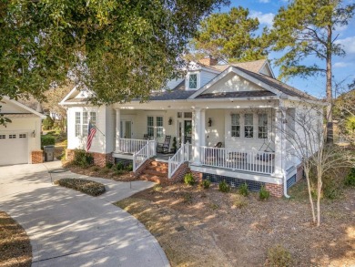 Immaculate Lakefront Gem in the Heart of Pawleys Island  Nestled on The Reserve Golf Club at Pawleys Island in South Carolina - for sale on GolfHomes.com, golf home, golf lot