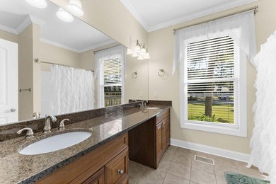 Set along the 10th fairway of the Santee National Golf Club on Santee National Golf Course in South Carolina - for sale on GolfHomes.com, golf home, golf lot