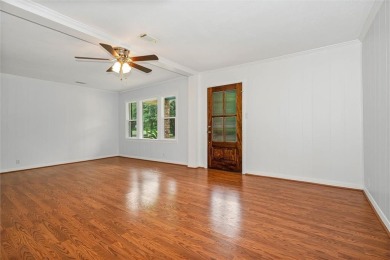 Welcome to this charming 1,530 square foot brick and slab, low on Magnolia Grove Golf Club in Alabama - for sale on GolfHomes.com, golf home, golf lot