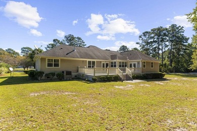 Set along the 10th fairway of the Santee National Golf Club on Santee National Golf Course in South Carolina - for sale on GolfHomes.com, golf home, golf lot