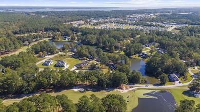 Set along the 10th fairway of the Santee National Golf Club on Santee National Golf Course in South Carolina - for sale on GolfHomes.com, golf home, golf lot