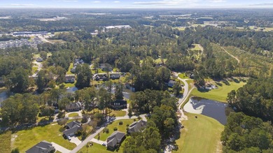 Set along the 10th fairway of the Santee National Golf Club on Santee National Golf Course in South Carolina - for sale on GolfHomes.com, golf home, golf lot