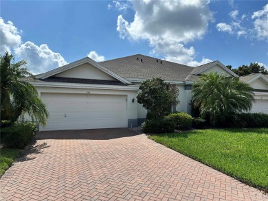 Resort style living at its best in this light and bright on Falcon Watch Golf Club in Florida - for sale on GolfHomes.com, golf home, golf lot