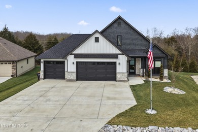Emitting quality, comfort, and warmth, this pristine home makes on Tellico Village Golf Club in Tennessee - for sale on GolfHomes.com, golf home, golf lot