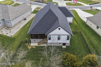 Emitting quality, comfort, and warmth, this pristine home makes on Tellico Village Golf Club in Tennessee - for sale on GolfHomes.com, golf home, golf lot