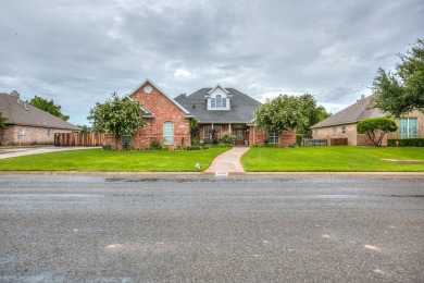 Welcome to this stunning 4-bedroom, 4-bath home located in the on Bentwood Country Club in Texas - for sale on GolfHomes.com, golf home, golf lot