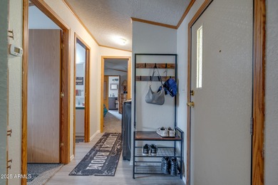 Welcome home to lively resort-style living at La Casa Blanca, a on Apache Creek Golf Club in Arizona - for sale on GolfHomes.com, golf home, golf lot