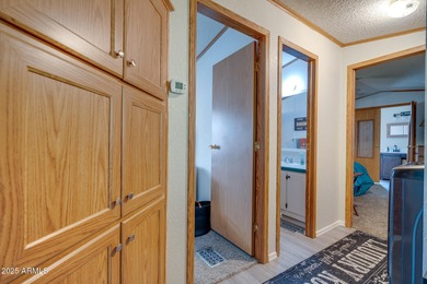 Welcome home to lively resort-style living at La Casa Blanca, a on Apache Creek Golf Club in Arizona - for sale on GolfHomes.com, golf home, golf lot