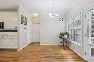 Nestled on a rare, just-under-an-acre lot at the end of a quiet on Collins Hill Golf Club in Georgia - for sale on GolfHomes.com, golf home, golf lot