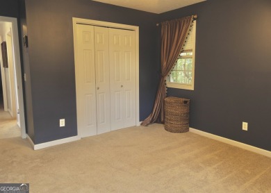 Step into this beautifully maintained home that welcomes you on Fairfield Plantation Golf and Country Club in Georgia - for sale on GolfHomes.com, golf home, golf lot