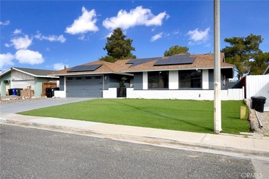 Welcome to this meticulously cared-for Victorville gem, where on Green Tree Golf Course in California - for sale on GolfHomes.com, golf home, golf lot