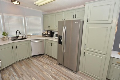 LAND OWNED-NO LAND LEASE This beautifully updated home is on Savanna Golf Club in Florida - for sale on GolfHomes.com, golf home, golf lot