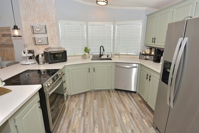 LAND OWNED-NO LAND LEASE This beautifully updated home is on Savanna Golf Club in Florida - for sale on GolfHomes.com, golf home, golf lot