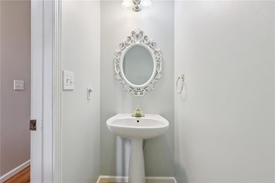 Nestled on a rare, just-under-an-acre lot at the end of a quiet on Collins Hill Golf Club in Georgia - for sale on GolfHomes.com, golf home, golf lot