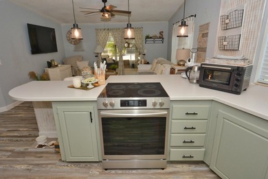 LAND OWNED-NO LAND LEASE This beautifully updated home is on Savanna Golf Club in Florida - for sale on GolfHomes.com, golf home, golf lot