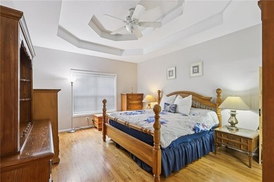 Nestled on a rare, just-under-an-acre lot at the end of a quiet on Collins Hill Golf Club in Georgia - for sale on GolfHomes.com, golf home, golf lot