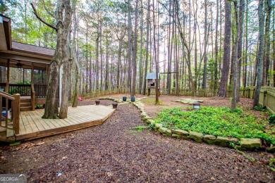 Step into this beautifully maintained home that welcomes you on Fairfield Plantation Golf and Country Club in Georgia - for sale on GolfHomes.com, golf home, golf lot