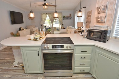 LAND OWNED-NO LAND LEASE This beautifully updated home is on Savanna Golf Club in Florida - for sale on GolfHomes.com, golf home, golf lot