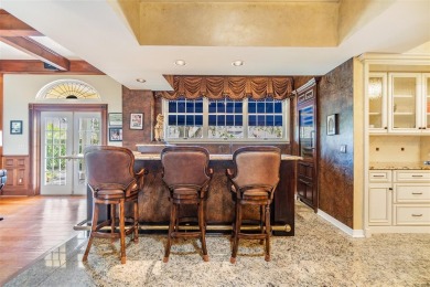 Tucked inside the gates of Cypress Run, this one-of-a-kind on Cypress Run Golf Club  in Florida - for sale on GolfHomes.com, golf home, golf lot