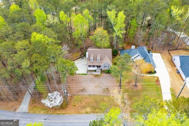 Step into this beautifully maintained home that welcomes you on Fairfield Plantation Golf and Country Club in Georgia - for sale on GolfHomes.com, golf home, golf lot