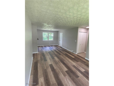 Charming and move-in ready, this 3-bedroom, 1-bath ranch in West on J. Edward Good Park Golf Course in Ohio - for sale on GolfHomes.com, golf home, golf lot