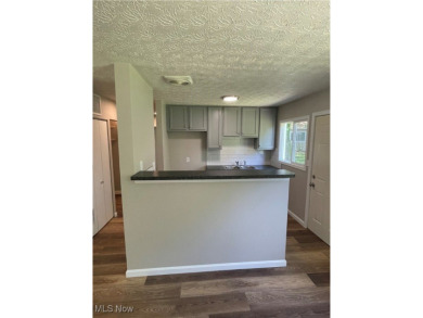 Charming and move-in ready, this 3-bedroom, 1-bath ranch in West on J. Edward Good Park Golf Course in Ohio - for sale on GolfHomes.com, golf home, golf lot