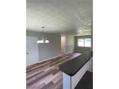 Charming and move-in ready, this 3-bedroom, 1-bath ranch in West on J. Edward Good Park Golf Course in Ohio - for sale on GolfHomes.com, golf home, golf lot