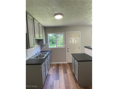 Charming and move-in ready, this 3-bedroom, 1-bath ranch in West on J. Edward Good Park Golf Course in Ohio - for sale on GolfHomes.com, golf home, golf lot
